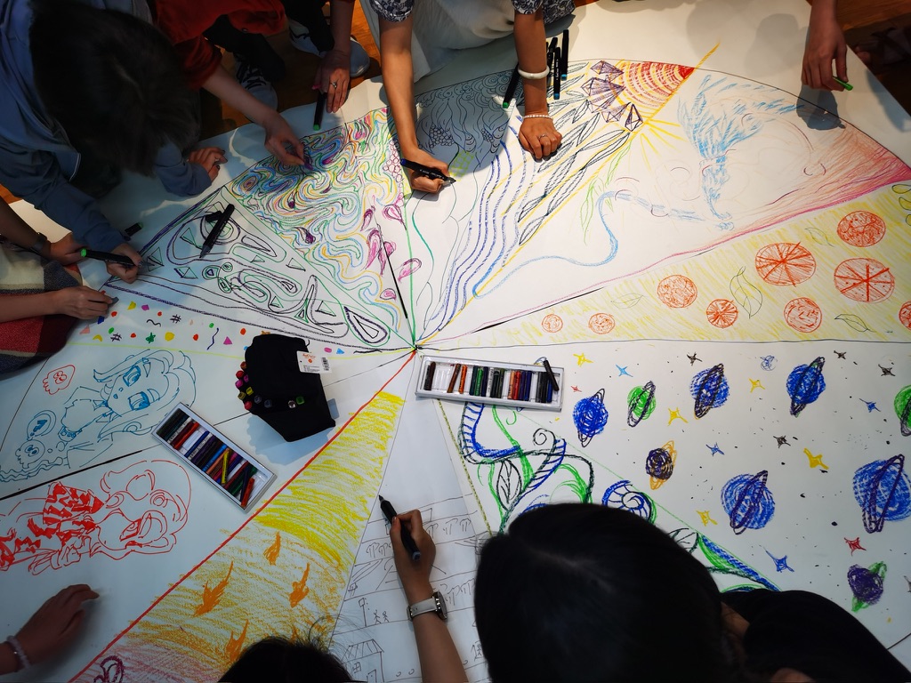 Top-down view of a collaborative radial drawing
