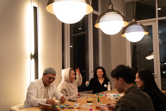 Evening session beneath warm pendant lights