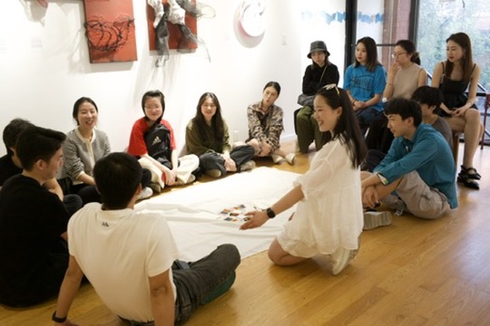 Gallery sit-circle with shared canvas and group reflection