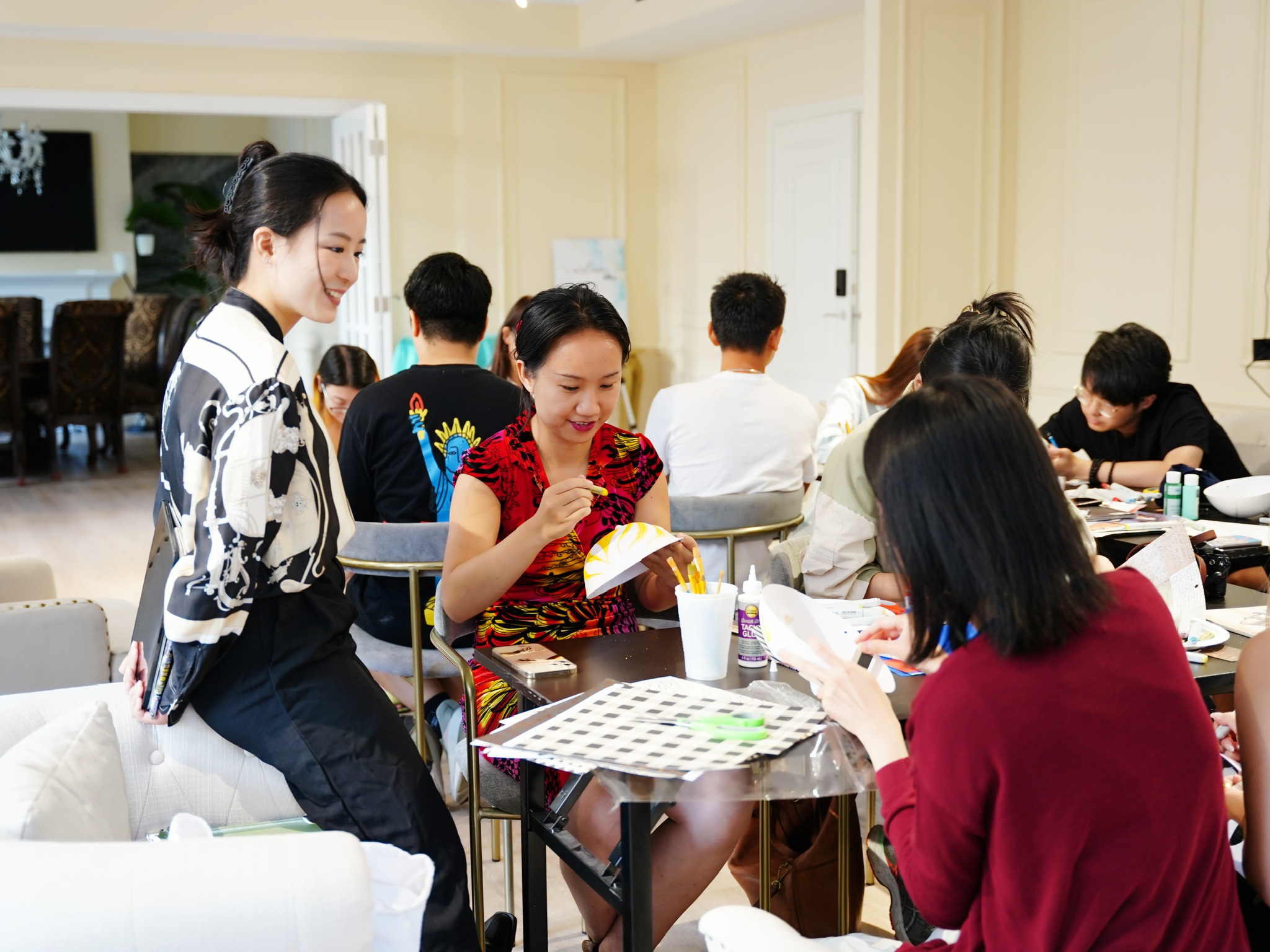 Group paper-craft session in a community space